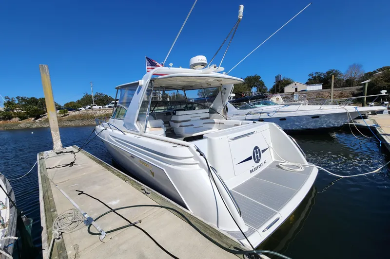 H Yacht Photos Pics 2000 Formula 41 Performance Cruiser docked at marina under clear blue sky.