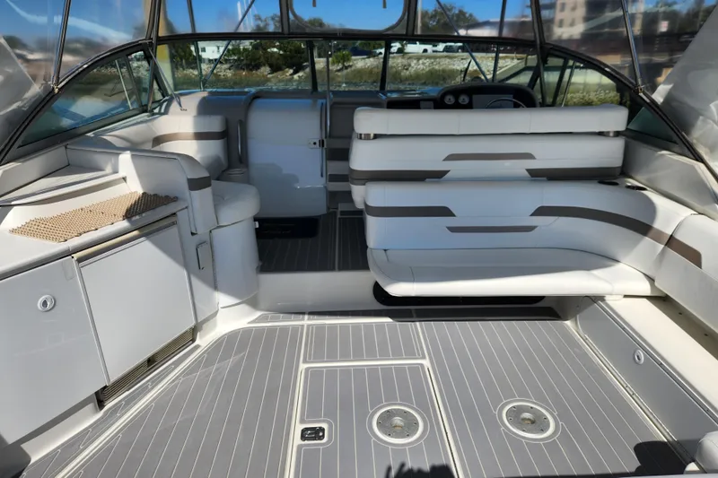 H Yacht Photos Pics Interior of 2000 Formula 41 Performance Cruiser with white seating and modern design.