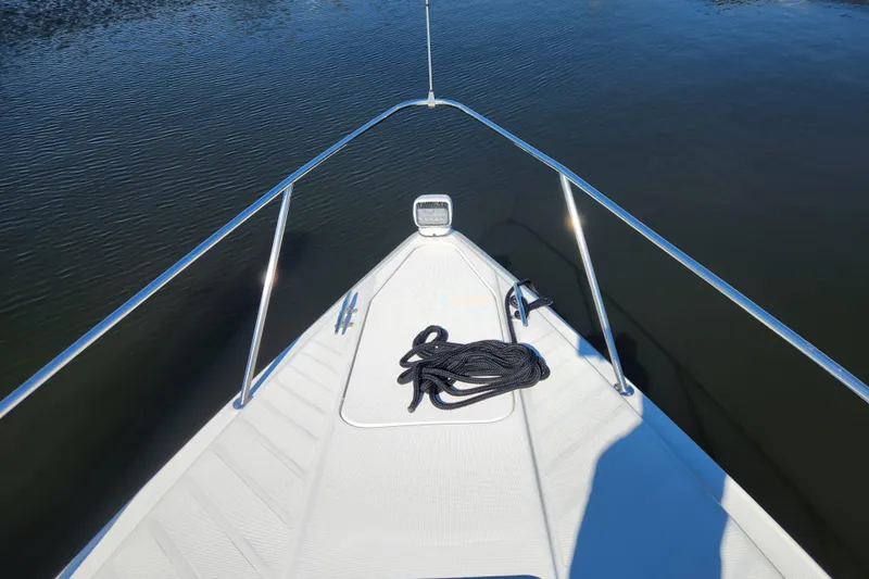 H Yacht Photos Pics Bow of 2000 Formula 41 Performance Cruiser with coiled rope on deck.