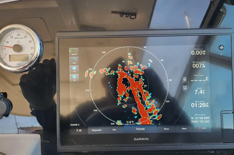 H Yacht Photos Pics Garmin navigation display on 2000 Formula 41 Performance Cruiser, showing radar and GPS data.