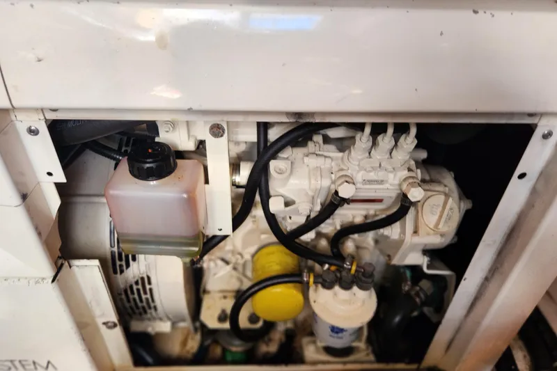 H Yacht Photos Pics Engine compartment of a 2000 Formula 41 Performance Cruiser, showing mechanical components.