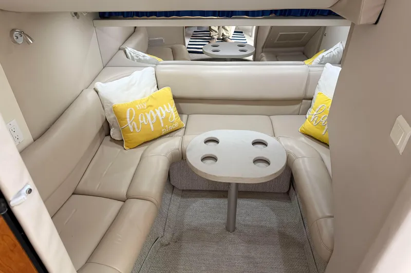 H Yacht Photos Pics Interior of 2000 Formula 41 Performance Cruiser with beige seating and decorative pillows.