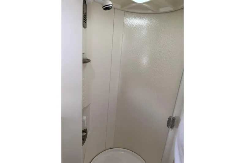 H Yacht Photos Pics Shower area in 2000 Formula 41 Performance Cruiser boat, featuring white interior.
