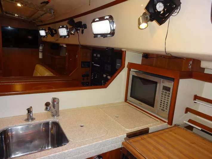 Don't Blink Yacht Photos Pics Galley looking forward to starboard salon