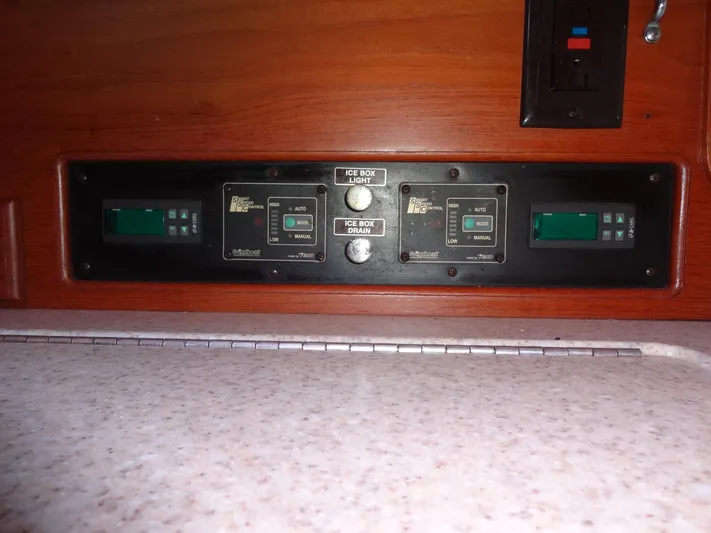 Don't Blink Yacht Photos Pics Control panel on 2006 Island Packet 440 yacht, featuring digital displays and switches.