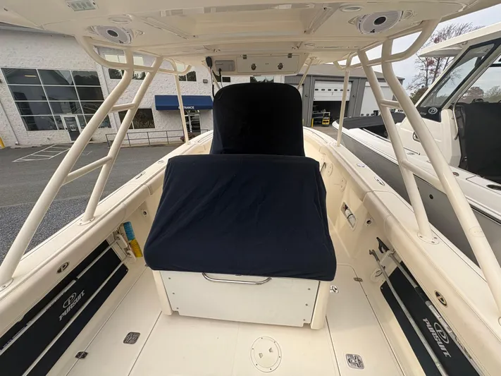  Yacht Photos Pics 2014 Pursuit C 280 Center Console boat interior with covered seating.