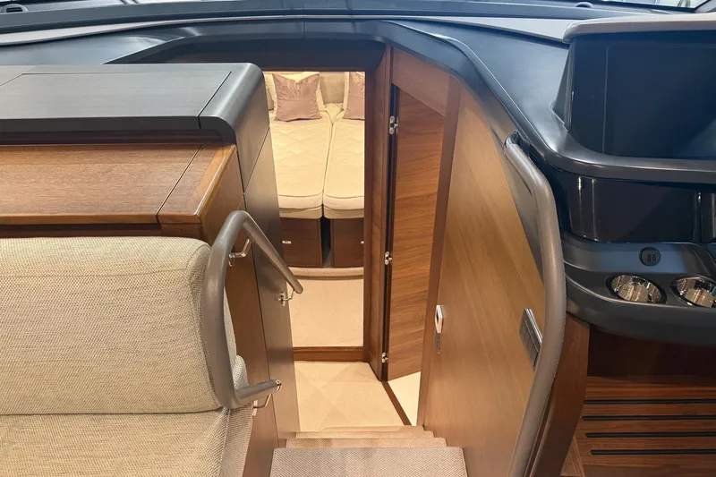 F45095 Yacht Photos Pics Interior of 2023 Princess F45 yacht, featuring luxurious wood and fabric finishes.