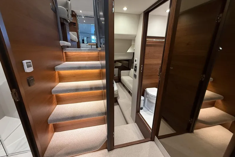 F45095 Yacht Photos Pics Luxurious interior of 2023 Princess F45 yacht with elegant wood finishes and modern amenities.