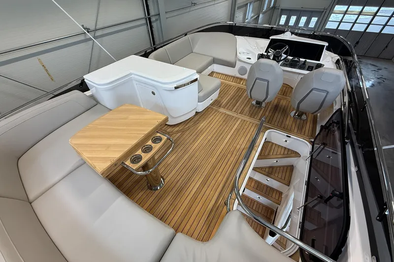 F45095 Yacht Photos Pics Luxurious 2023 Princess F45 yacht interior with elegant seating and modern helm station.