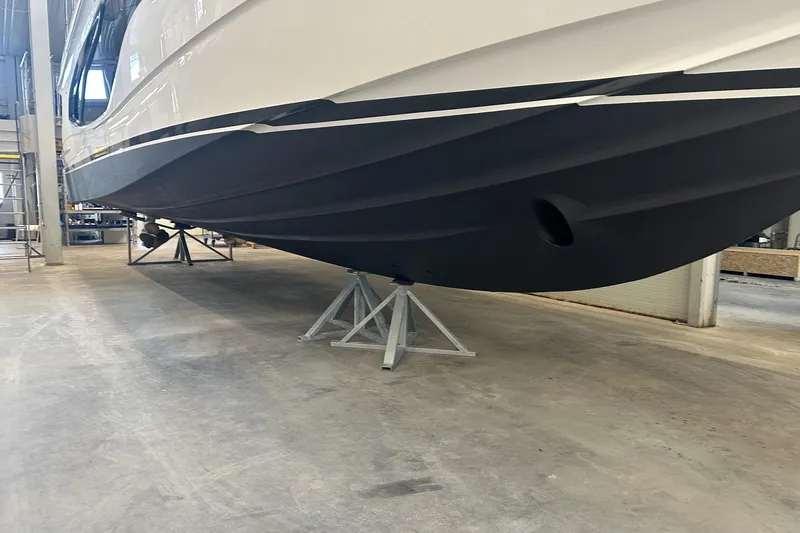 F45095 Yacht Photos Pics 2023 Princess F45 yacht in a workshop, supported on stands.