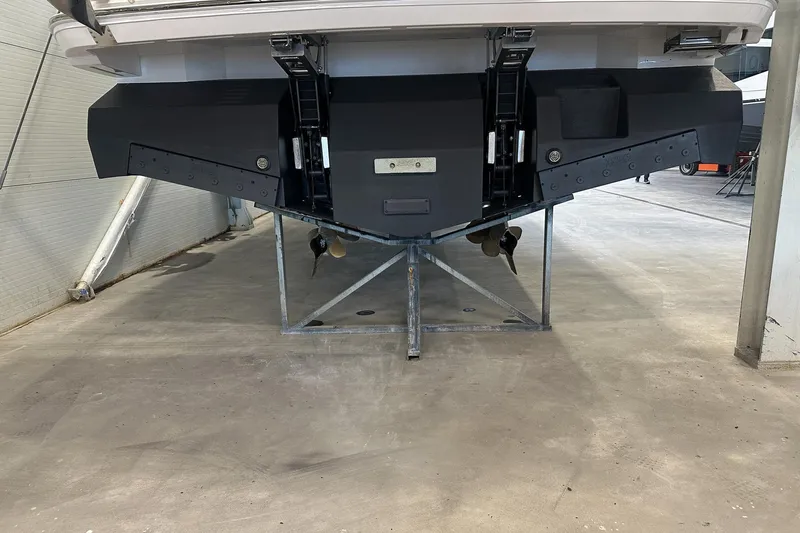 F45095 Yacht Photos Pics 2023 Princess F45 yacht stern view in a storage facility.