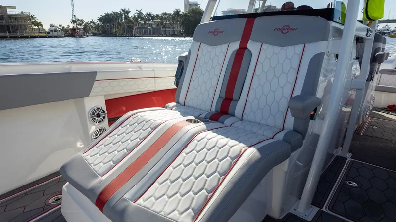 Havana Club Yacht Photos Pics 2023 Fountain 38 SC boat with luxurious seating and stylish design on the water.