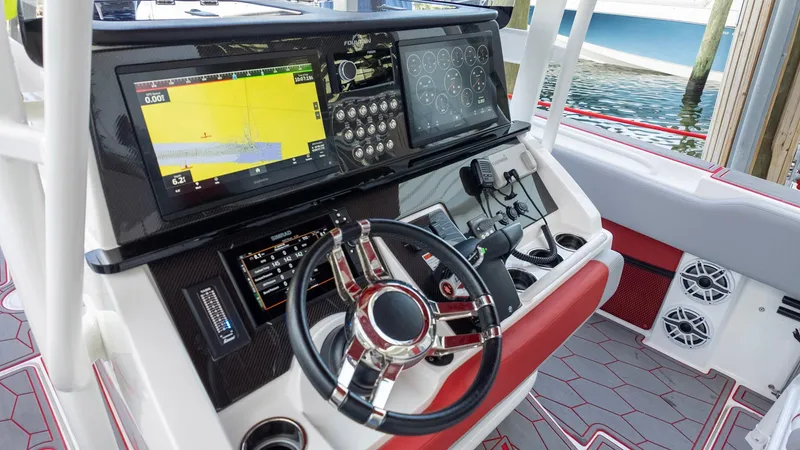 Havana Club Yacht Photos Pics 2023 Fountain 38 SC boat dashboard with advanced navigation and control systems.