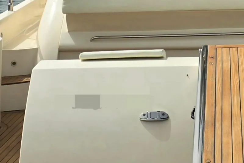  Yacht Photos Pics 2003 Cayman Yachts 55-58 Walkaround HT, rear deck view with wooden finish.