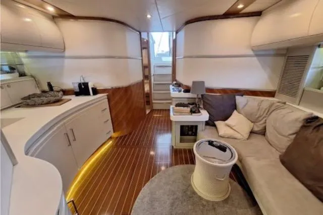  Yacht Photos Pics Luxurious interior of 2003 Cayman Yachts 55-58 Walkaround HT with elegant seating and modern design.