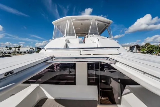 Catfish Yacht Photos Pics 2017 Leopard 51 Powercat yacht with sleek design under a clear blue sky.