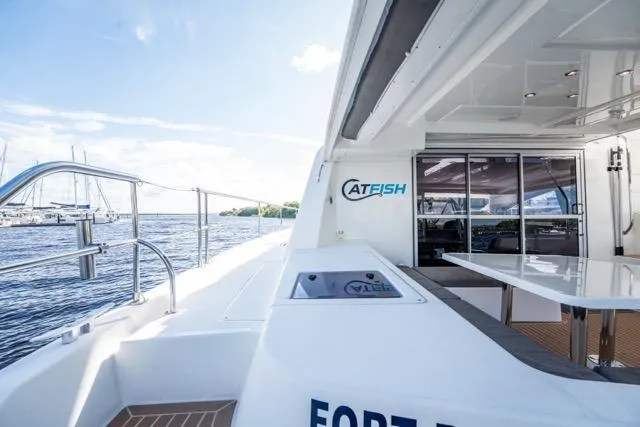 Catfish Yacht Photos Pics 2017 Leopard 51 Powercat yacht with spacious deck and modern design on the water.