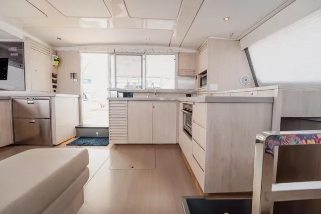 Catfish Yacht Photos Pics Interior of 2017 Leopard 51 Powercat yacht, featuring modern kitchen and sleek design.