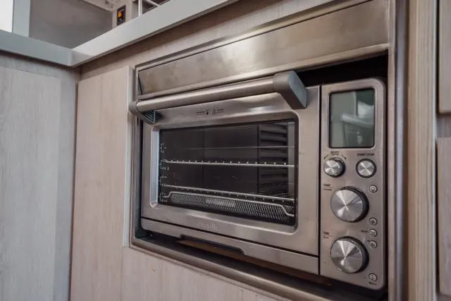 Catfish Yacht Photos Pics Built-in stainless steel oven in 2017 Leopard 51 Powercat yacht kitchen.