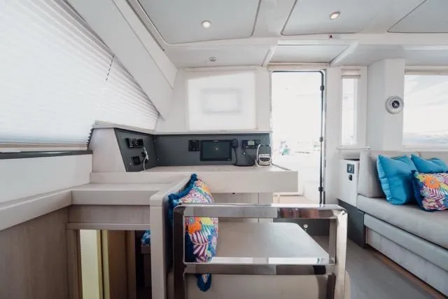 Catfish Yacht Photos Pics Interior of 2017 Leopard 51 Powercat with modern design and colorful cushions.