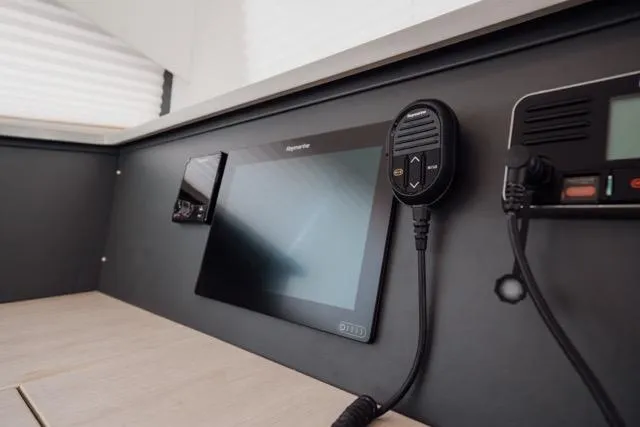 Catfish Yacht Photos Pics Control panel of 2017 Leopard 51 Powercat featuring navigation and communication equipment.