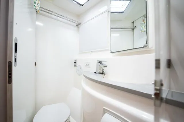 Catfish Yacht Photos Pics Modern bathroom in 2017 Leopard 51 Powercat yacht, featuring sleek design and fixtures.