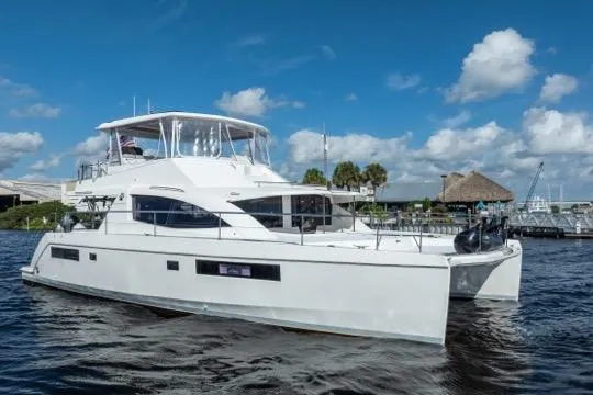 Catfish Yacht Photos Pics 2017 Leopard 51 Powercat yacht on water under blue sky.