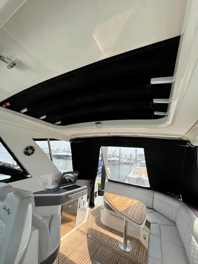 Wahine Yacht Photos Pics 2021 Sea Ray Sundancer 320 OB interior with sleek design and modern amenities.