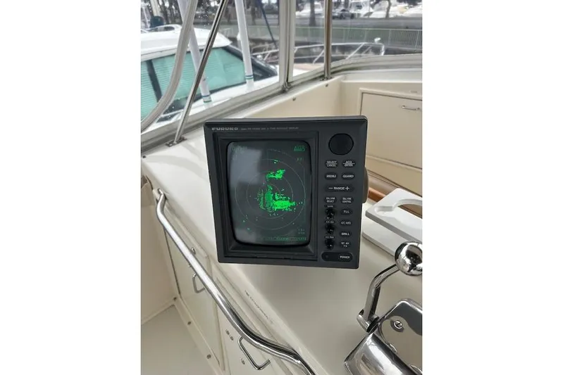 Reel'n In Style Yacht Photos Pics Radar display on 1988 Ocean 44' Super Sport yacht dashboard.
