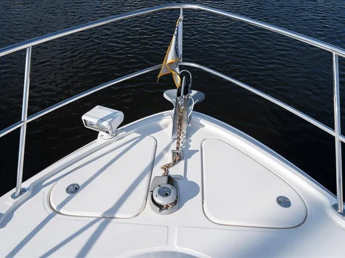  Yacht Photos Pics Bow of 2015 Sea Ray 510 Inboard Sundancer yacht with anchor and railing.