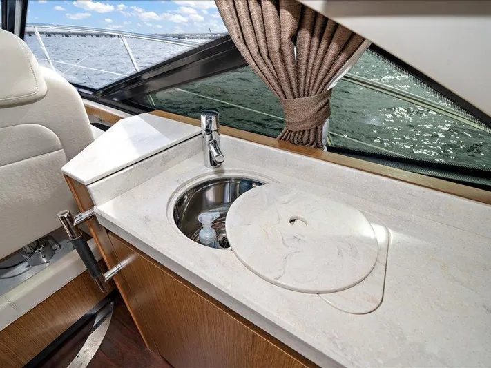  Yacht Photos Pics Luxurious 2015 Sea Ray 510 Sundancer yacht interior with sleek sink and countertop.