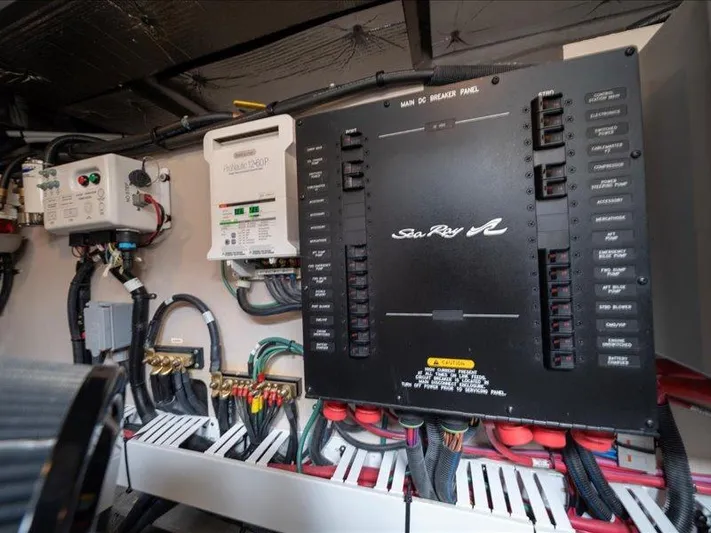  Yacht Photos Pics Electrical panel of 2015 Sea Ray 510 Inboard Sundancer yacht, featuring wiring and circuit breakers.
