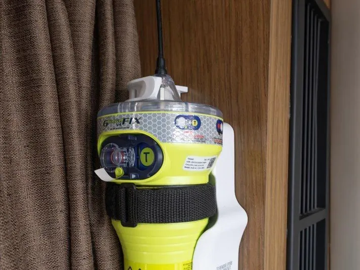  Yacht Photos Pics Emergency beacon on 2015 Sea Ray 510 Inboard Sundancer yacht, mounted on wooden panel.