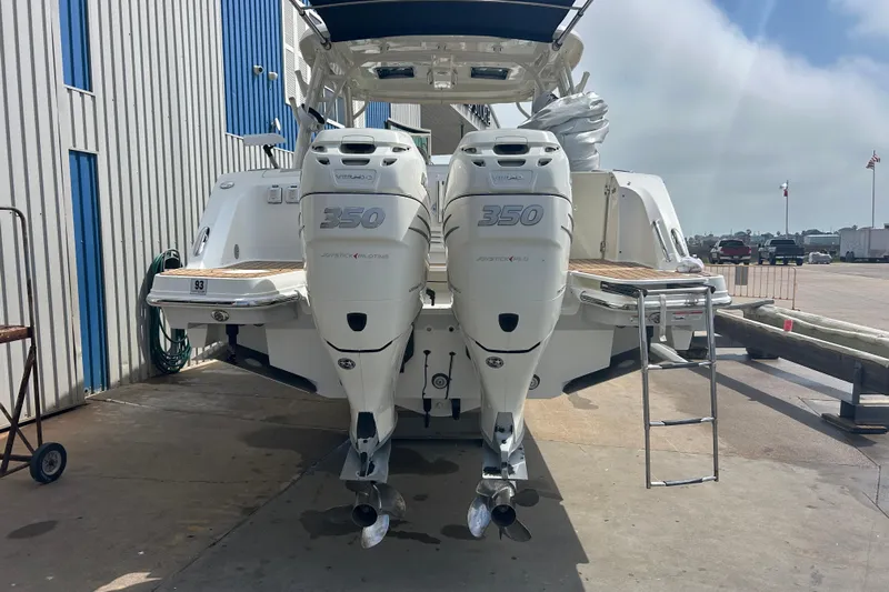  Yacht Photos Pics 2017 Boston Whaler 320 Vantage with twin 350 engines at dockside.