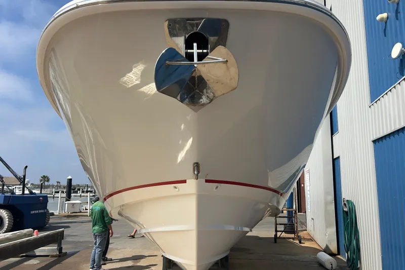  Yacht Photos Pics 2017 Boston Whaler 320 Vantage boat docked at marina, front view.