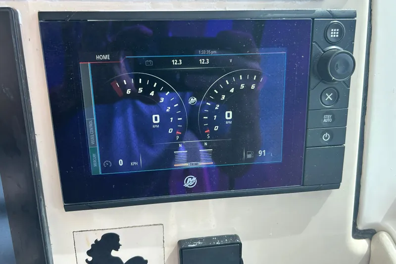  Yacht Photos Pics Dashboard display of a 2017 Boston Whaler 320 Vantage boat, showing RPM and speed.