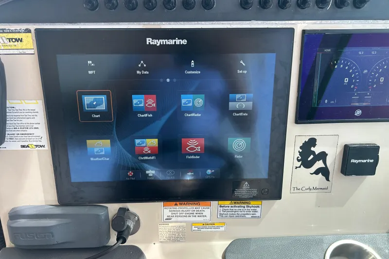  Yacht Photos Pics Control panel of a 2017 Boston Whaler 320 Vantage with Raymarine navigation display.