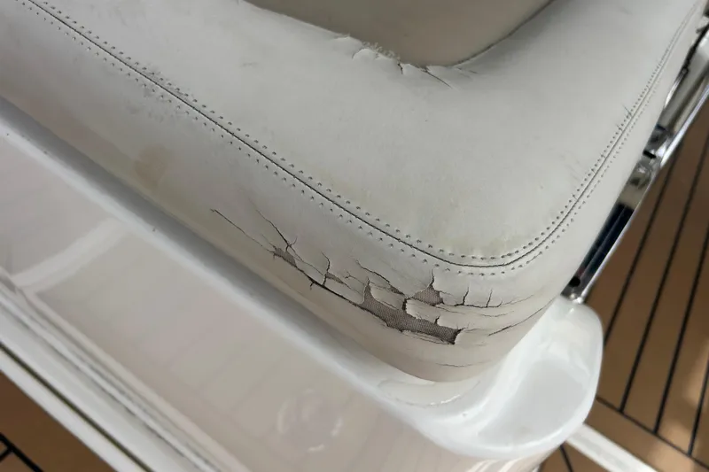  Yacht Photos Pics Cracked seat upholstery on 2017 Boston Whaler 320 Vantage boat.