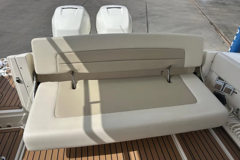  Yacht Photos Pics 2017 Boston Whaler 320 Vantage boat seating area with dual engines.