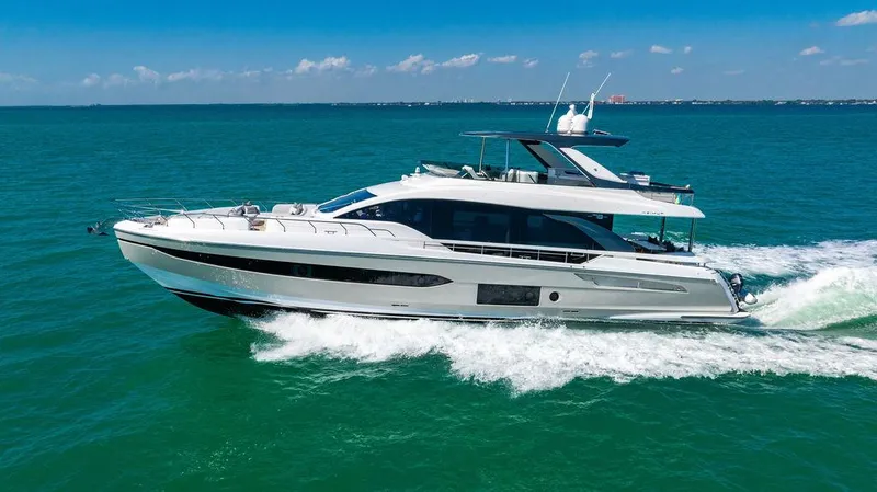 Bongani Yacht Photos Pics 2024 Azimut Fly 78 yacht cruising on open water under clear blue skies.