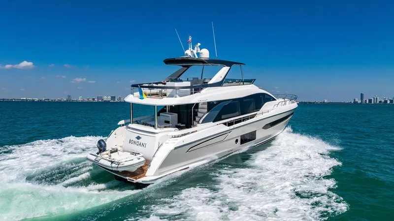 Bongani Yacht Photos Pics 2024 Azimut Fly 78 yacht cruising on open water under clear blue skies.