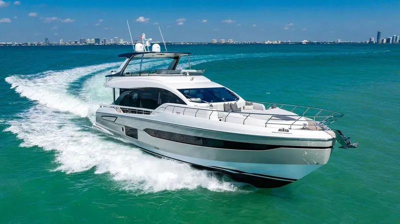 Bongani Yacht Photos Pics 2024 Azimut Fly 78 yacht cruising on turquoise ocean waters.