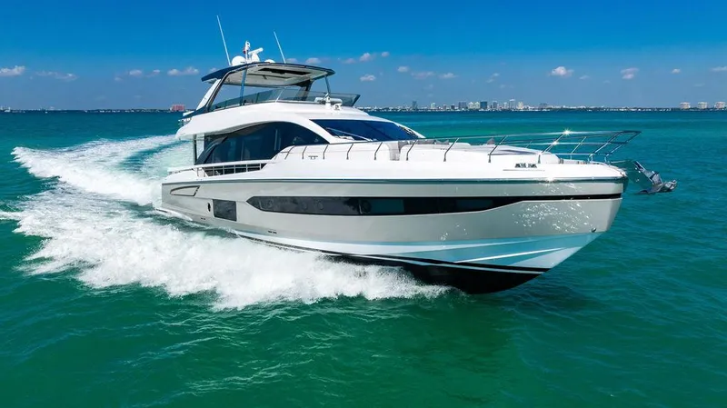 Bongani Yacht Photos Pics 2024 Azimut Fly 78 yacht cruising on open water under clear blue skies.