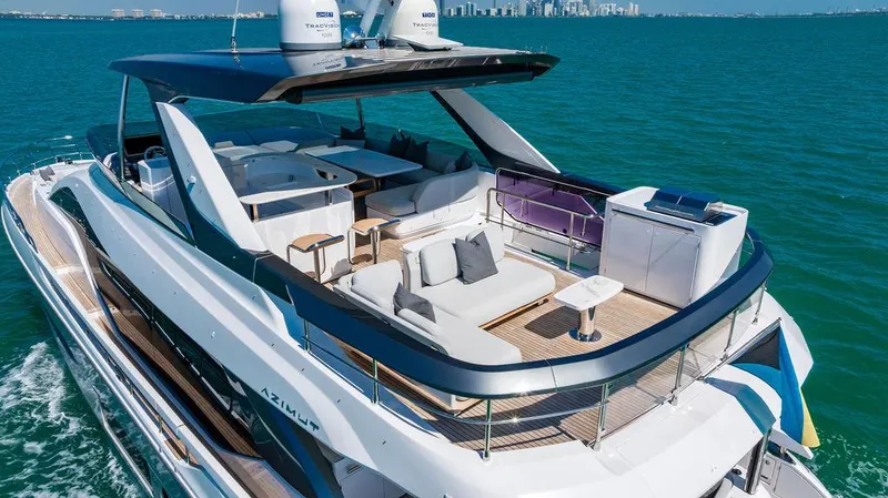 Bongani Yacht Photos Pics 2024 Azimut Fly 78 yacht cruising on open water, featuring luxurious deck seating.