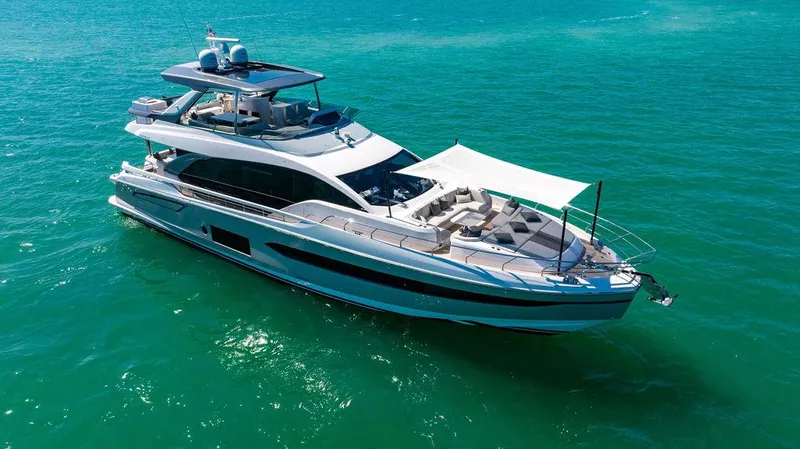 Bongani Yacht Photos Pics 2024 Azimut Fly 78 yacht cruising on turquoise waters.