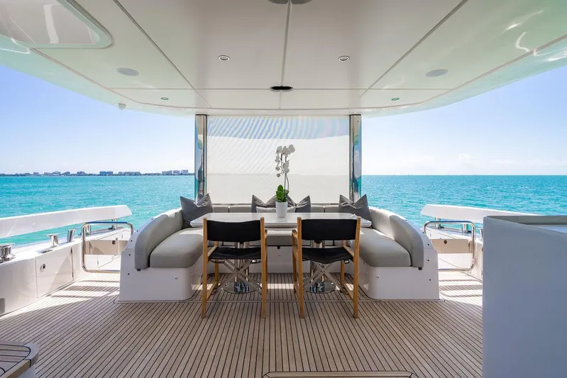 Bongani Yacht Photos Pics Luxurious 2024 Azimut Fly 78 yacht deck with elegant seating and ocean view.