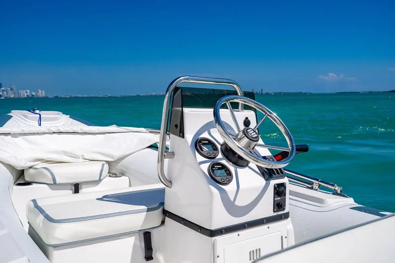 Bongani Yacht Photos Pics 2024 Azimut Fly 78 yacht helm with ocean view and clear blue sky.