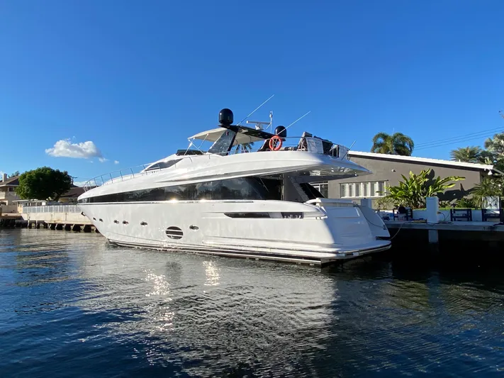  Yacht Photos Pics Luxury 2007 Rodriquez 80 Widebody yacht docked under clear blue sky.
