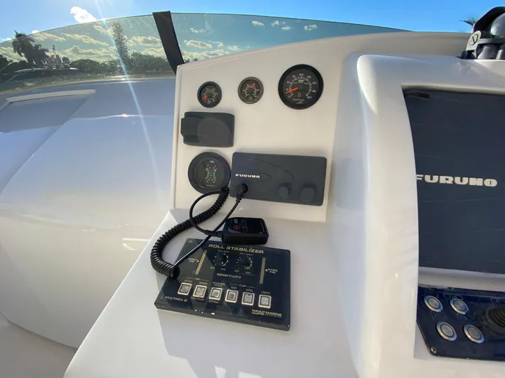  Yacht Photos Pics Control panel of a 2007 Rodriquez 80 Widebody yacht with navigation instruments.