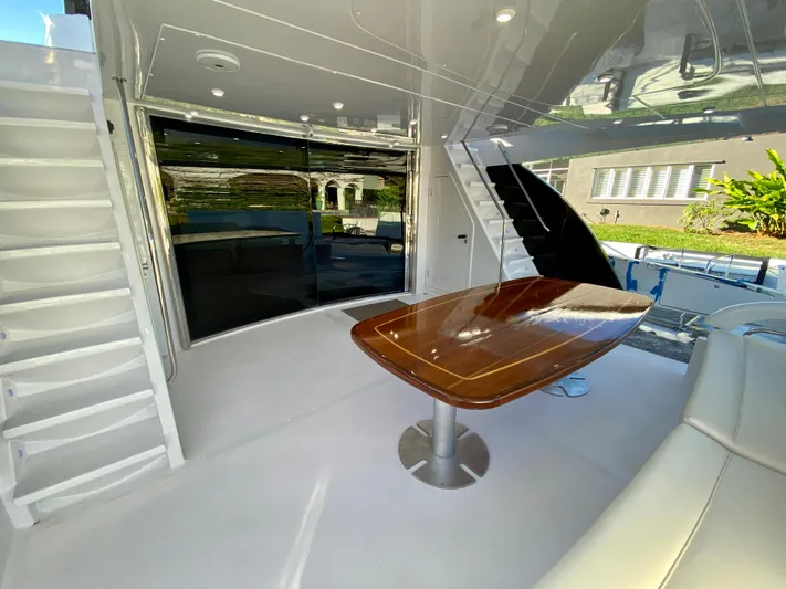  Yacht Photos Pics Luxurious 2007 Rodriquez 80 Widebody yacht interior with sleek table and modern design.